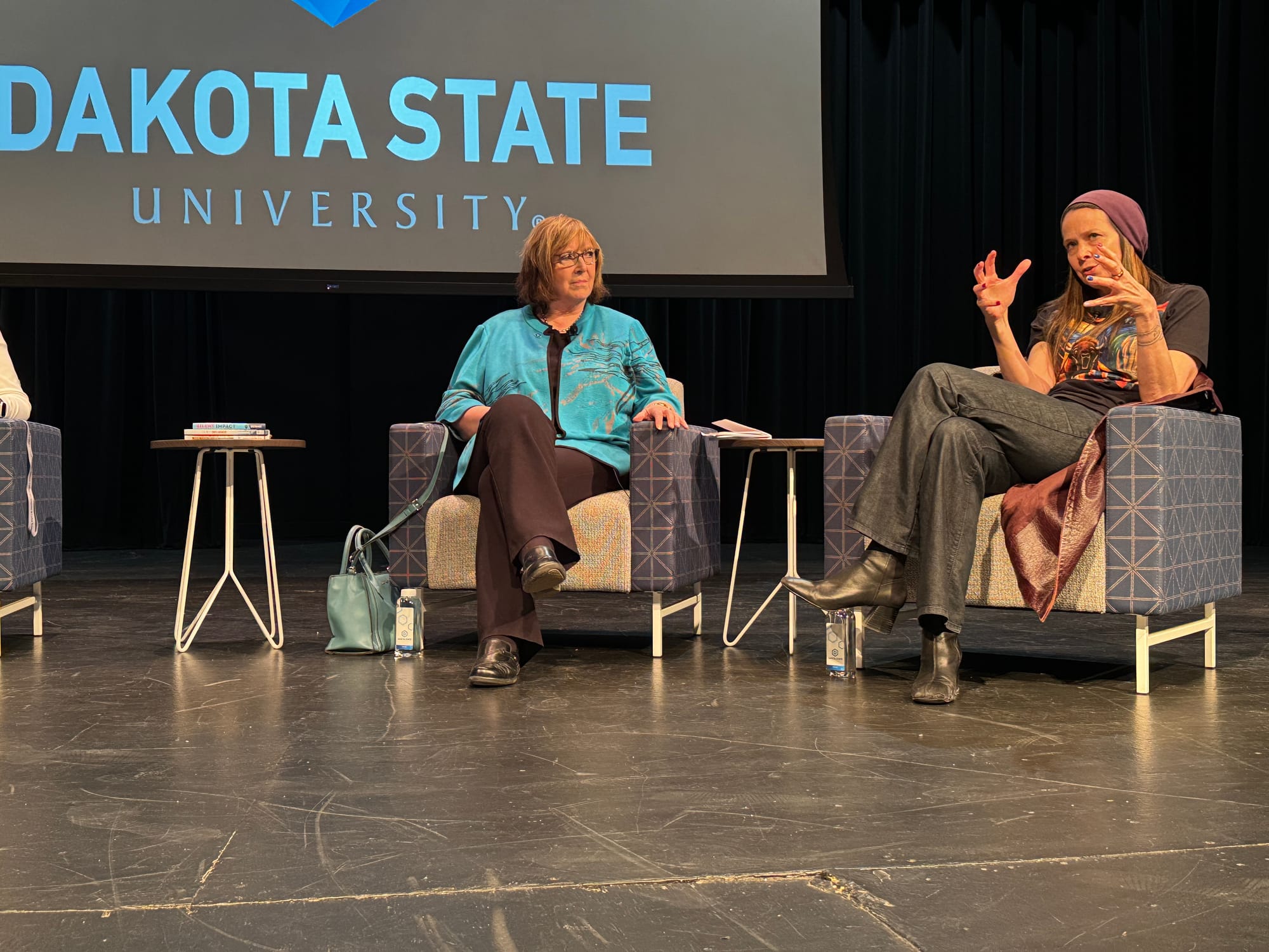 Dakota State University President Jose-Marie Griffiths sits on stage with with Jen Easterly during the DakotaCon event.