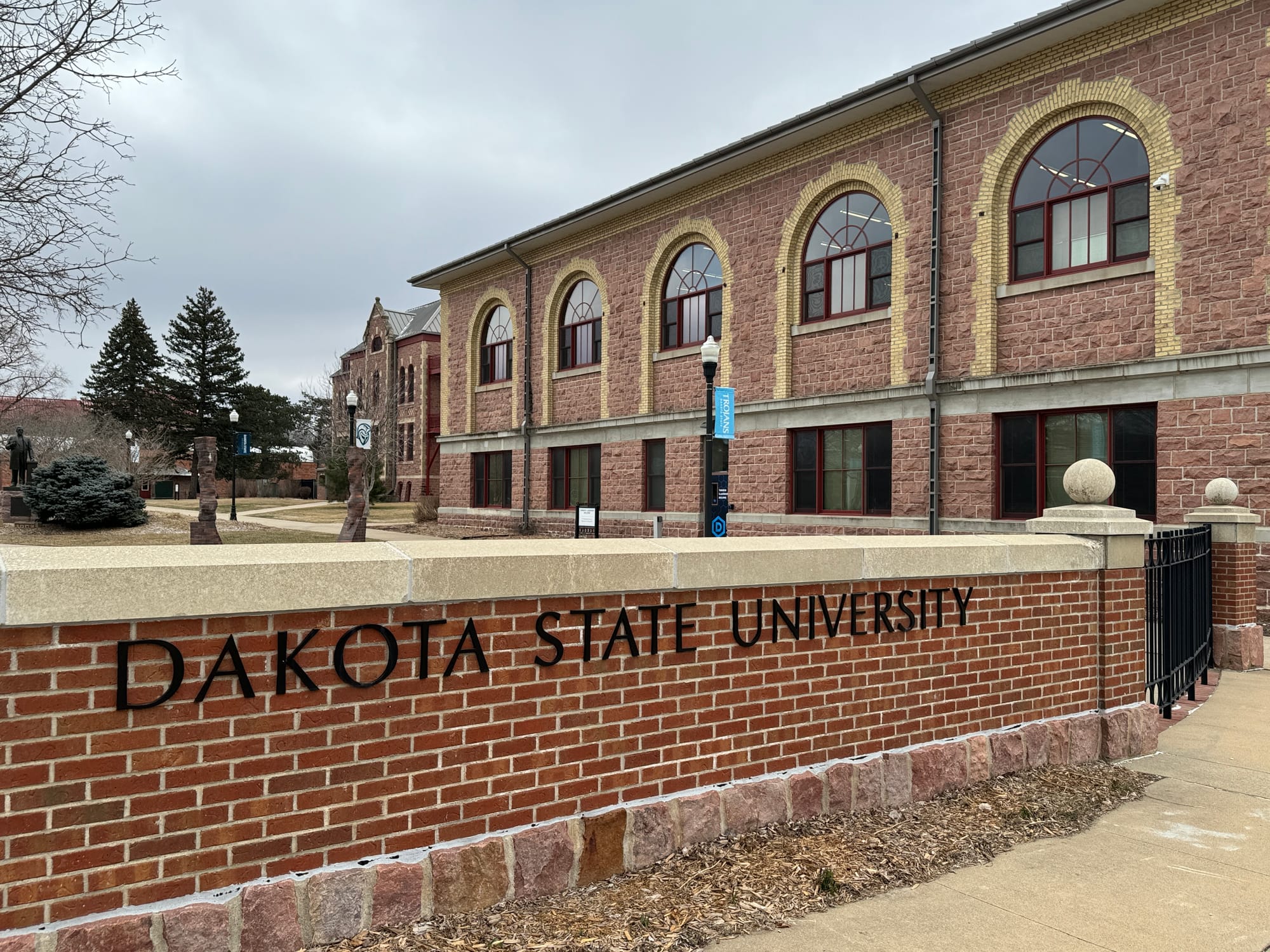 The exterior of a brick building on the campus of Dakota State University