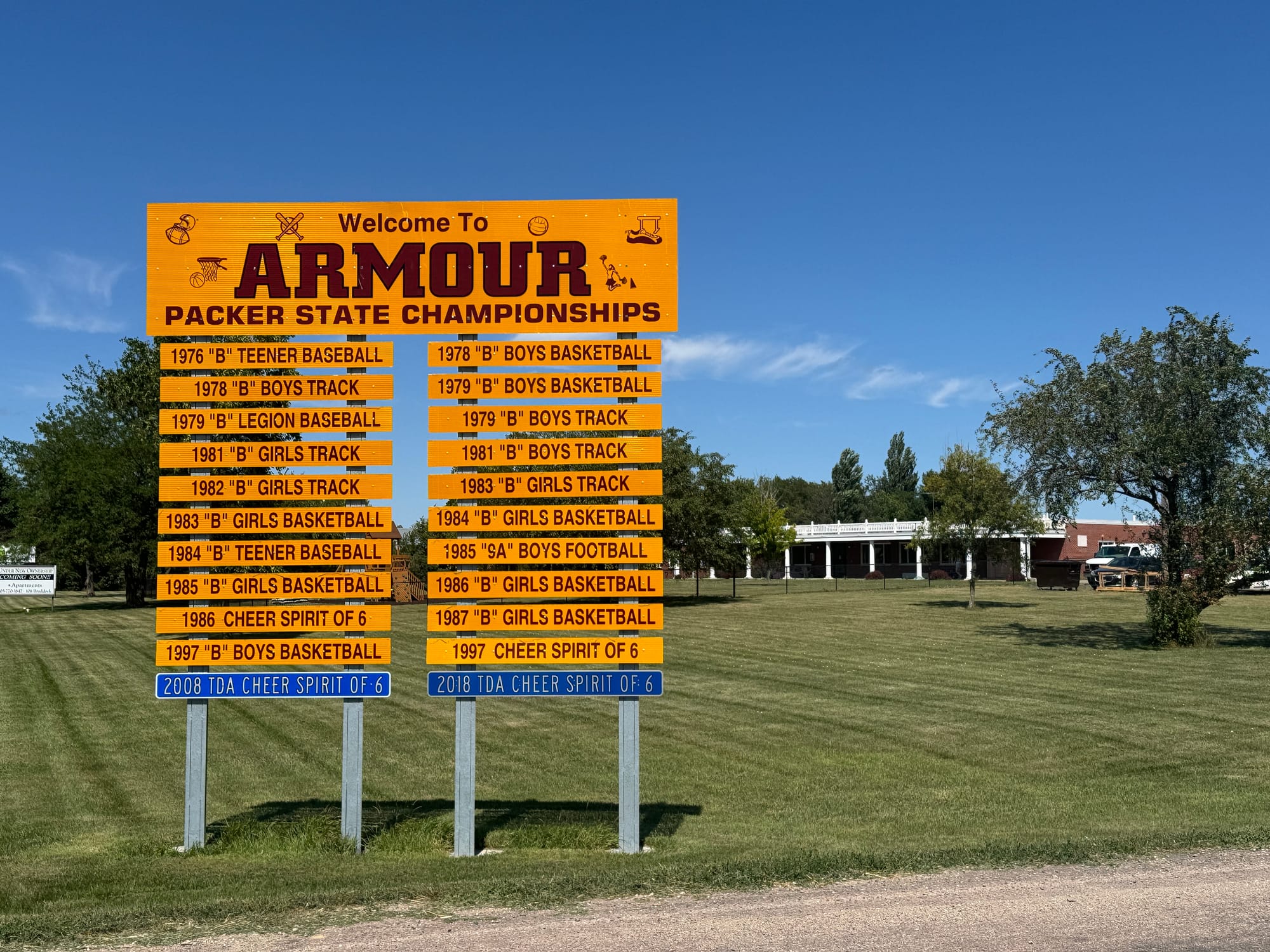 A welcome to Armour sign shows all of the state titles its high school sports team have won.