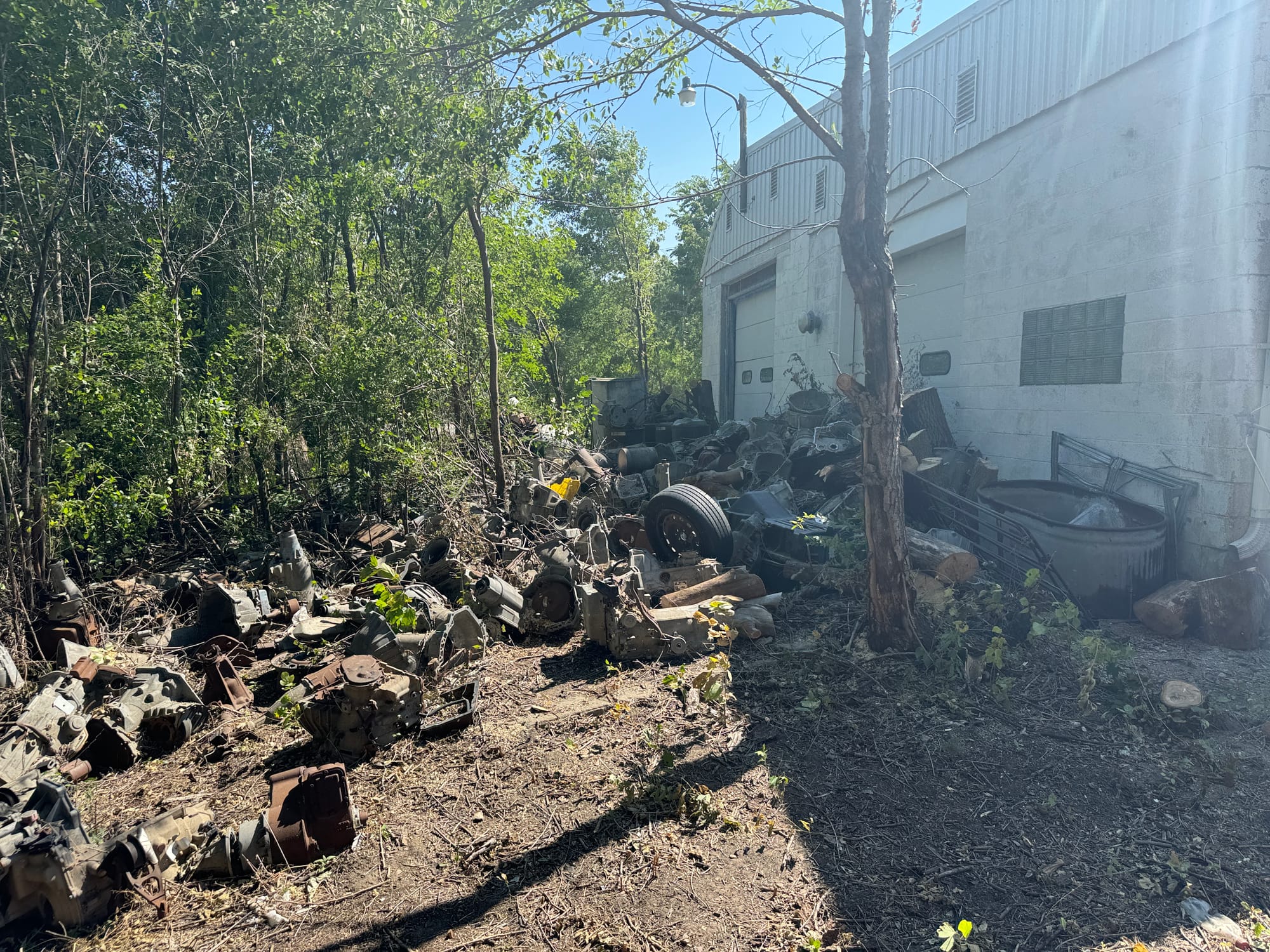 Debris and tires sits outside a business in Armour, South Dakota