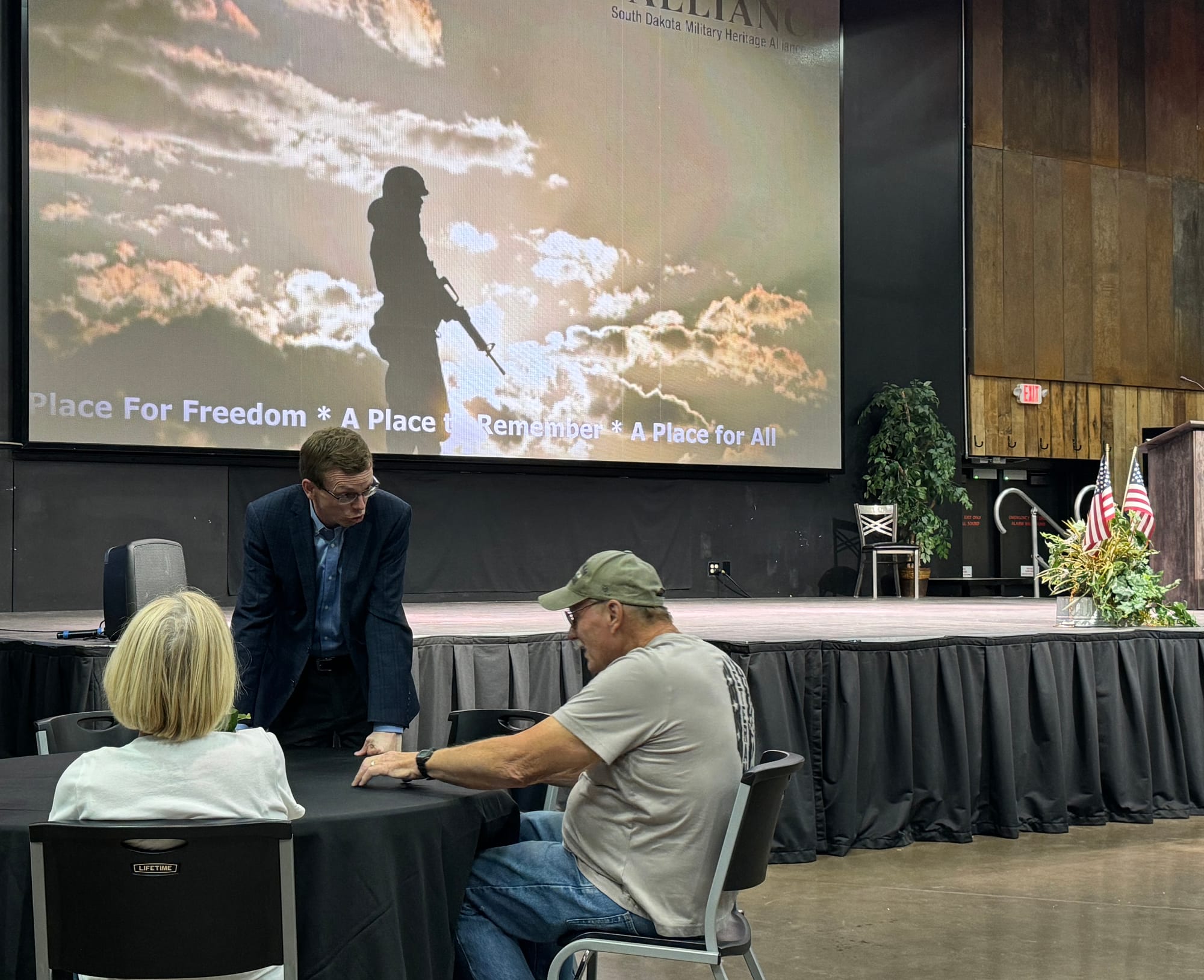 South Dakota U.S. Rep. Dusty Johnson meets with a veteran during an event at the Military Heritage Alliance in Sioux Falls, 