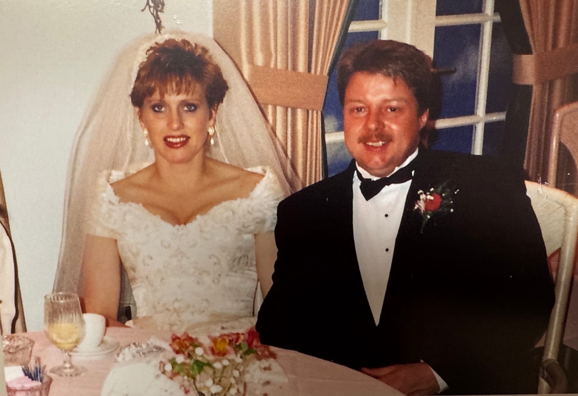 Greg and Pam Sands wear their wedding outfits during a reception for their marriage in 1995 in las Vegas.