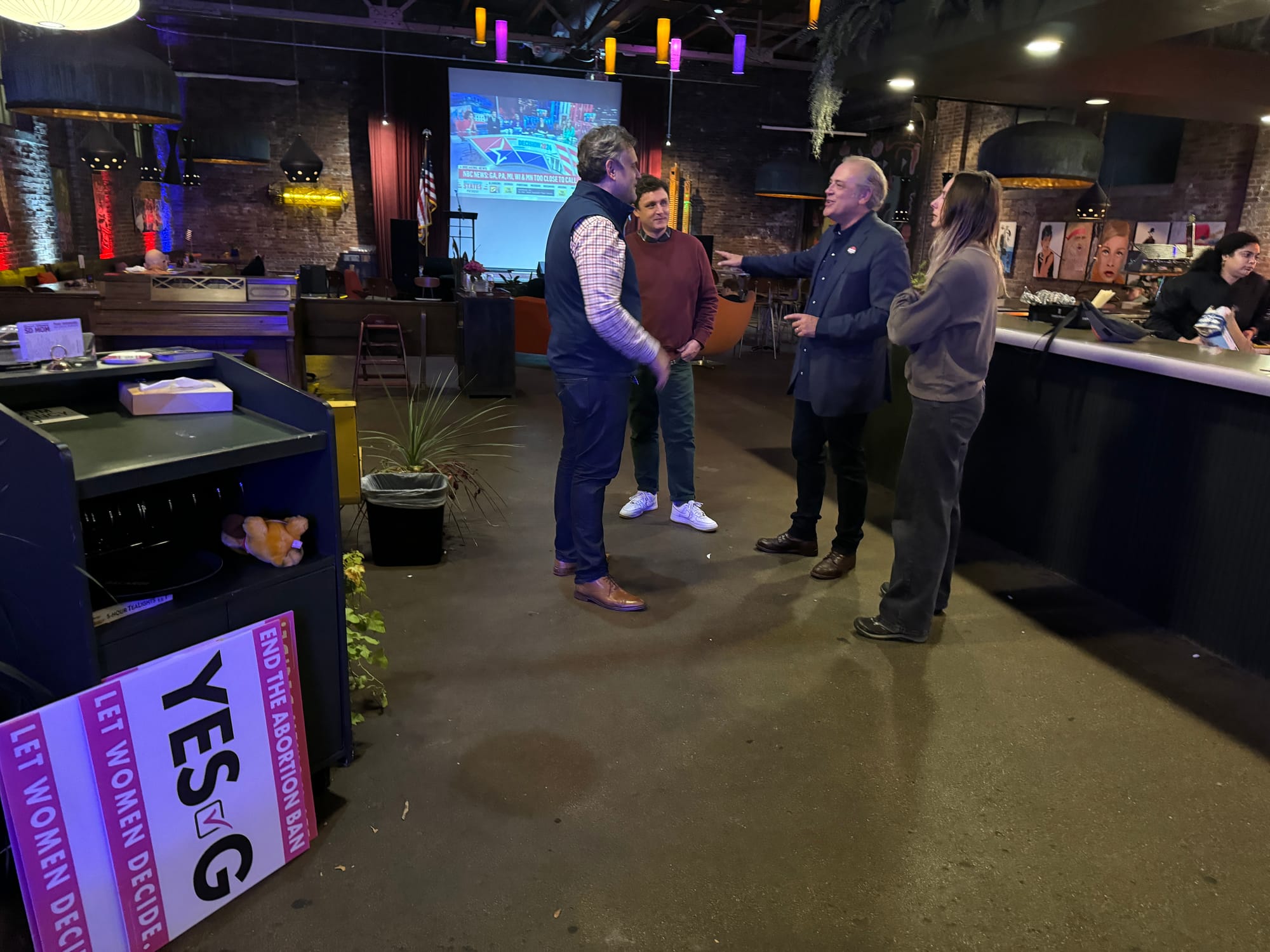 Dakotans for Health founder Rick Weiland (second from right) talks with family and supporters at the ICON Lounge in Sioux Falls, S.D., 