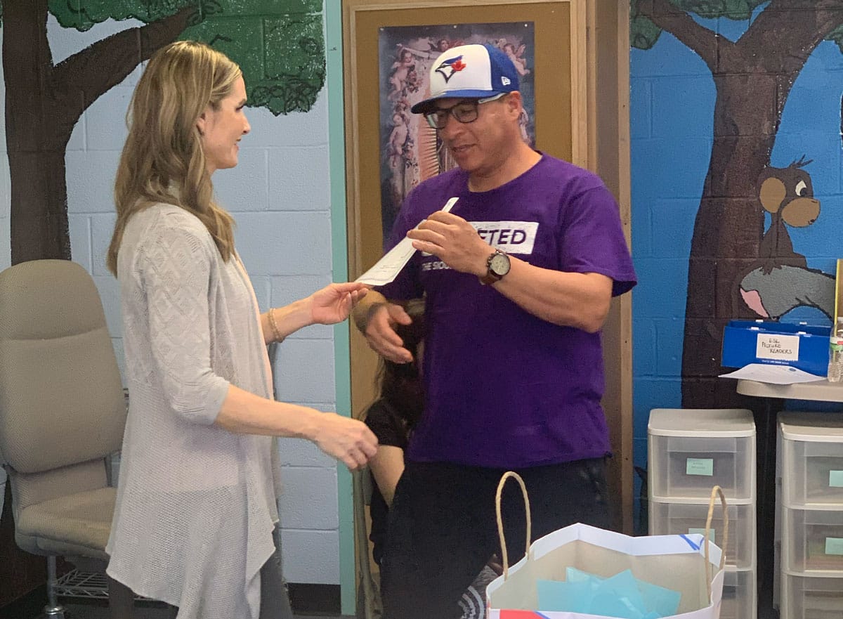 An Hispanic immigrant receives his Level One English certification at Caminando Juntos, a Sioux Falls, S.D.-based ministry sponsored by the Aberdeen Presentation Sisters. 