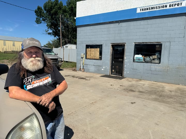 Dudley Schroeder stands in front of his business, Transmission Depot, on Aug. 8, 2024, in Armour, South Dakota.