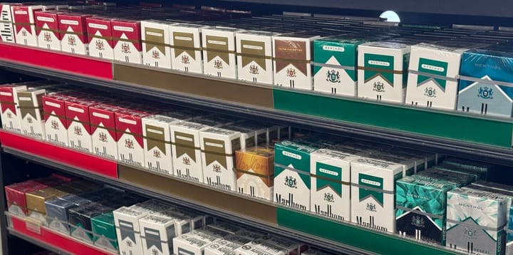 Cigarette packs are shown in a store