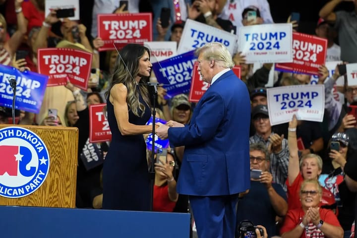 Gov. Kristi Noem introduces Donald Trump during a 2023 event in Rapid City